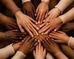 Many hands joined together
